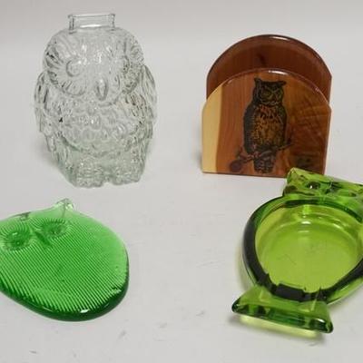 1178	FOUR PIECE OWL LOT, WISE OLD OWL BANK, 6 3/4 IN H, A SOUVINEER NAPKIN HOLDER, A GREEN GLASS HANGING PLAQUE & A GREEN GLASS ASHTRAY
