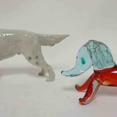 1312	PORCELAIN & GLASS DOGS, PORCELAIN DOG IS SIGNED HANDMADE GLASS DOG HAS MADE IN ITALY STICKER, LARGEST IS 9 IN L 
