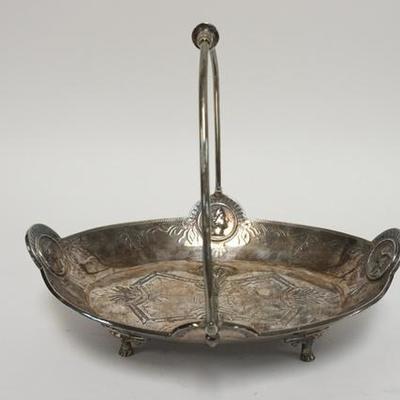 1059	VICTORIAN SILVERPLATED BASKET BY H.C REED JR. & CO NY HAS FOUR PORTRIAT MEDALIONS, 10 3/4 IN W, 9 1/4 IN H TO TOP OF HANDLE 

