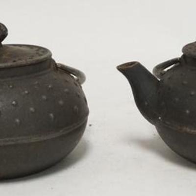 1262	PAIR OF ASIAN CAST IRON TEAPOTS CHARACTER SIGNED, 4 1/4 IN H 
