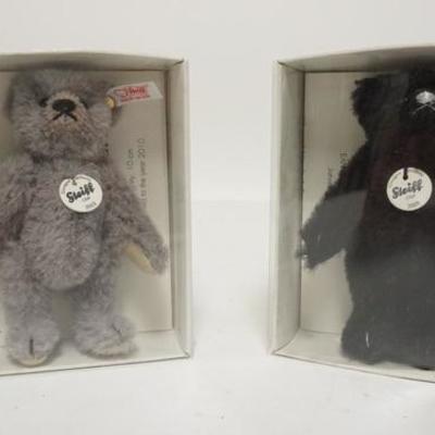 1093	TWO SMALL STEIFF JOINTED TEDDY BEARS IN BOXES W/ CERTIFICATES
