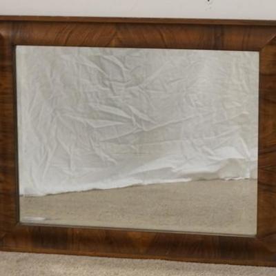 1135	BEVELED MIRROR IN MAHOGANY FRAME OVERALL DIMENSIONS ARE, 29 IN X 23 IN 
