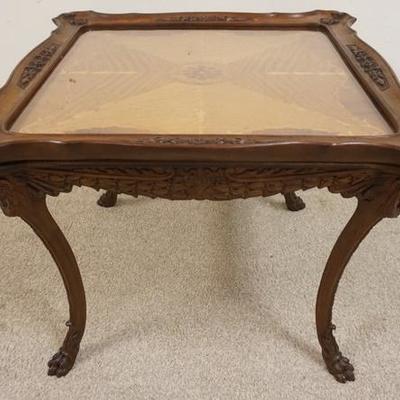 1039	CARVED & INLAID TRAY TABLE W/ CLAW FEET HAS A GLASS LIFT OFF TRAY TOP, 28 IN SQ, 21 1/2 IN H 
