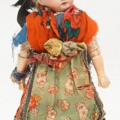 1308	A & M BISQUE HEAD DOLL W/ STAND 9 3/4 IN H 
