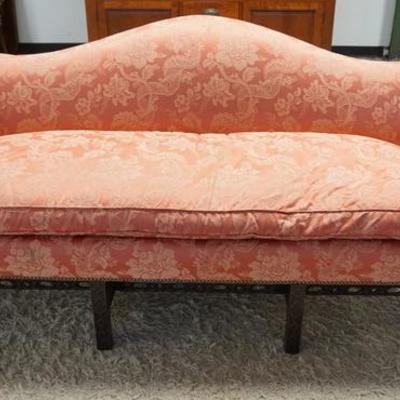 1114	CHIPPENDALE STYLE HUMP BACK SOFA W/ SALMON BROCADE UPHOLSTERY HAS CARVED LEGS & CUTOUT STRETCHERS 
