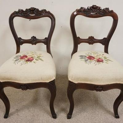 1044	PAIR OF ROSE CARVED CHAIRS W/ UPHOLSTERED SEATS 

