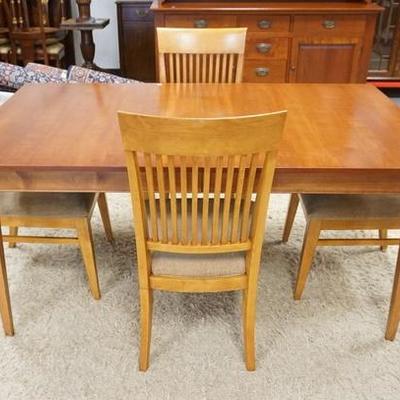 1206	ETHAN ALLEN CHERRY DINNING TABLE W/ FOUR CHIARS, TABLE IS 42 IN X 68 IN & HAS TWO 18 IN LEAVES
