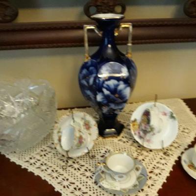 Several porcelain tea cups and a signed "Sale" art nouveau vase.