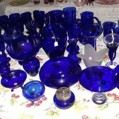 Large collection of cobalt blue glass.