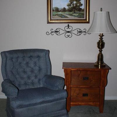 Blue Upholstered Swivel Rocker Easy Chair and Oak 2 Drawer Chest Side Table (26â€H x 26â€W x 16â€D).  Shown with Brass Table Lamp and...