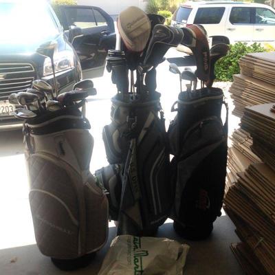 Women's set of golf clubs on right, $65 with bag!!