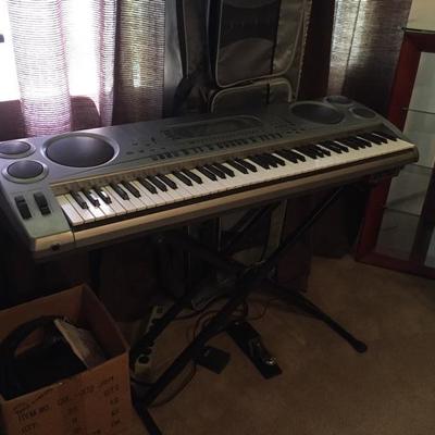 Casio WK-1800 keyboard with stand, carrying case & foot pedal