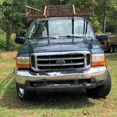 Lot #40  $5500 ~ Ford F250 '99  4X4 - 4 wheel drive/285K miles  Hide Away hitch and Gooseneck hitch  with work racks  (sorry TRUCK not...