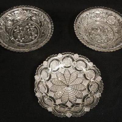 1098	THREE LACEY FLINT GLASS BOWLS, 6 1/2 TO 6 3/4 IN USUAL RIM ROUGHNESS
