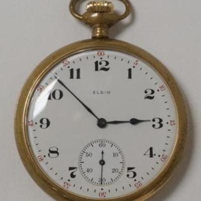 1052	ELGIN POCKET WATCH IN A GOLD FILLED CASE, HAS AN ENGRAVING OF A BIRD ON THE CASE
