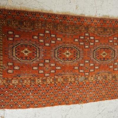 1045	RED ORIENTAL THROW RUG, SOME DAMGE NEAR THE CENTER OF THE RUG, 3 FT 9 IN X 2 FT 6 IN

