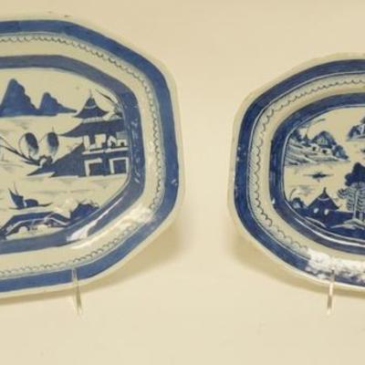 1034	TWO BLUE CANTON PLATTERS, LARGEST IS 11 3/4 IN X 8 7/8 IN & HAS SOME MINOR RIM CHIPS
