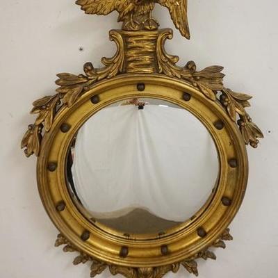 1059	BULLS EYE MIRROR IN GILT FRAME W/ EAGLE CREST, OVERALL DIMENSIONS 23 IN X 38 IN 
