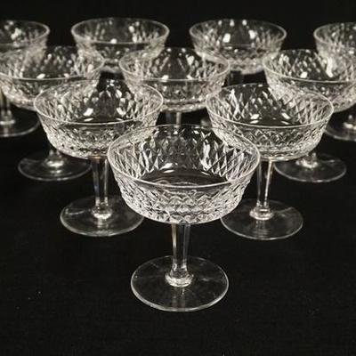 1021	SET OF 10 WATERFORD 4 1/8 IN CHAMPAGNES 
