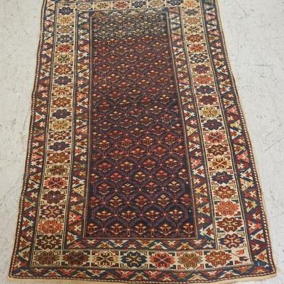 1049	SMALL ORIENTAL RUG 3 FT 7 IN X 5 FT, HAS DAMAGE 
