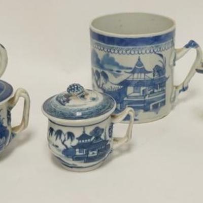 1044	FIVE PIECES OF BLUE & WHITE CANTON, MUG, TWO CREAMERS & TWO COVERED CUPS, MUG IS 4 IN H
