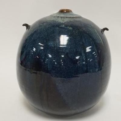 1091	LARGE BLUE GLAZED POTTERY VESSEL W/ TWO SMALL PROTRUSIONS BY THE CLAY CELLAR BY CLARA HOROWITZ, MONTCLAIRE NJ APP. 8 IN DIAMTER, 9...