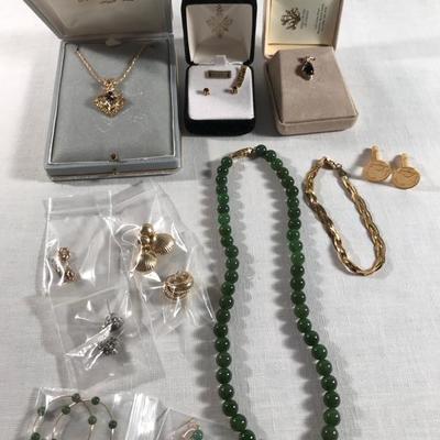 fine jewelry:
gold necklace in box 18K & sapphire $280
14K & black coral  in box $250
green jade necklace $55
14K loops $55; 10K earrings...