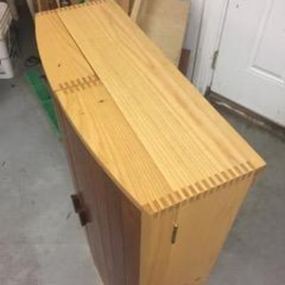 custom-made maple and cherry wall-hung tool cabinet. Closed, itâ€™s 26â€ wide by 36â€ high. $95
