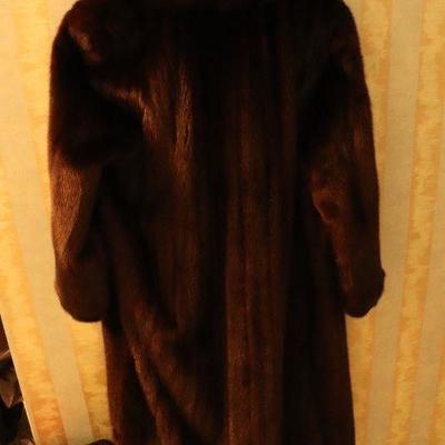 Back of black sable full length mink coat.