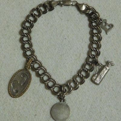 Sterling Charm Bracelet -- One Charm is 14 k and Sterling