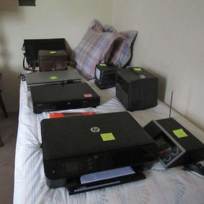Lots of electronics- cameras, radios, printer, shredder, scanner and more