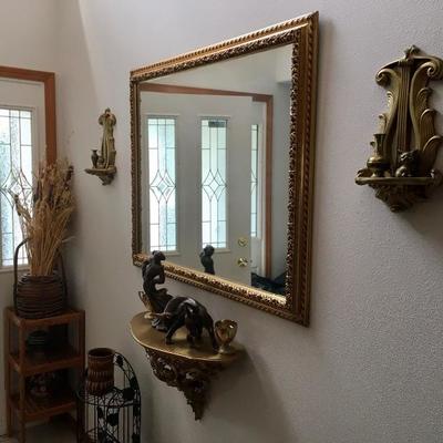 Gold mirror, wall sconces, side tables, home dÃ©cor