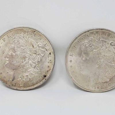 1020	

2 1921 Morgan Silver Dollars
Philadelphia Mint Marks