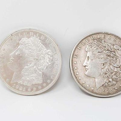 1010	

2 1921 Morgan Silver Dollars
Philadelphia Mint Marks