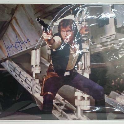 2180	

Han Solo Action Photo Signed By Harrison Ford - Has COA
Measures Approx 16