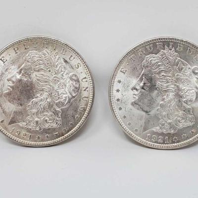 1012	

2 1921 Morgan Silver Dollars
Philadelphia Mint Marks