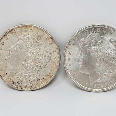 1018	

2 1921 Morgan Silver Dollars
Philadelphia Mint Marks