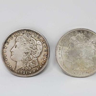1023	

2 1921 Morgan Silver Dollars
San Francisco and Philadelphia Mint Marks