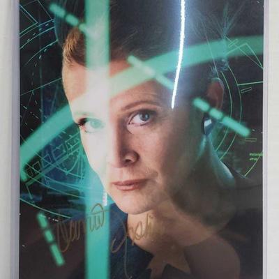 2204	

Photograph Signed By Carrie Fisher - Not Authenticated
Photograph Signed By Carrie Fisher - Not Authenticated
