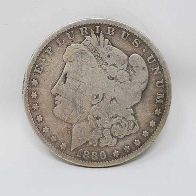 1013	

1 1889 Morgan Silver Dollar
New Orleans Mint Mark