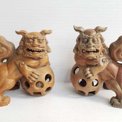 2402	

2 Wooden Fu Dog Statues
Measures Approx 7
