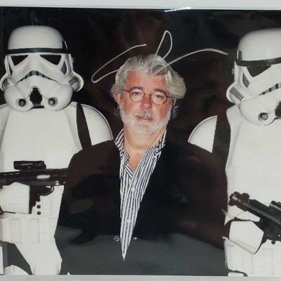 2164	

Photograph Signed By George Lucas - Has COA
Has COA Is Sealed Measures Approx 10