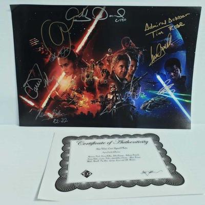 2176	

Star Wars Cast Signed Photo - Has COA
Signed By Harrison Ford, Daisy Ridley, John Boyega, Anthony Daniels, Kenny Baker, Carrie...