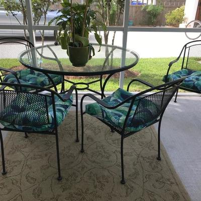 Glass and metal table with 4 chairs $225
Table 48 X 29