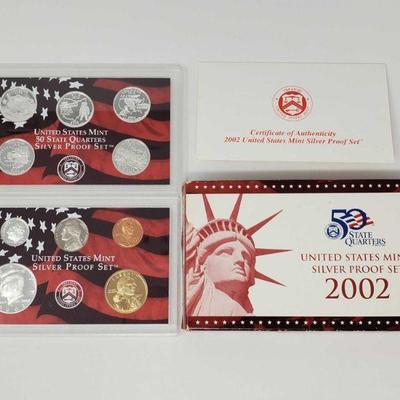 1022	
2002 United States Mint Silver Proof Set- With COA
2002 United States Mint Silver Proof Set- With C