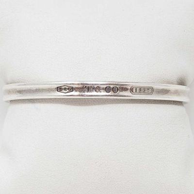 902	
Tiffany & Co. Sterling Silver 1837 Cuff, 18.5g
Weighs Approx 18.5g.
OS20-012564.3. 3/5.