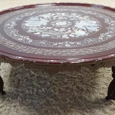 1020	MOP INLAID COFFEE TABLE WITH BIRDS AND FLOWERS. 39 1/4 IN DIAMETER, 13 IN HIGH
