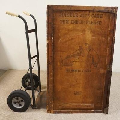 1036	VICTROLA FLOOR MODEL WOODEN SHIPPING CRATE. HINGED DOOR. HAS NIPPER BY THE VICTROLA ON 2 SIDES. ADDRESSED TO A STORE IN PASSAIC NJ....