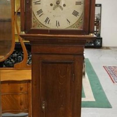 1035	TALL  CASE CLOCK WITH PAINTED TIN FACE AND BRASS  EAGLE FINIAL. FACE MARKED YEOUIL.84 IN HIGH
