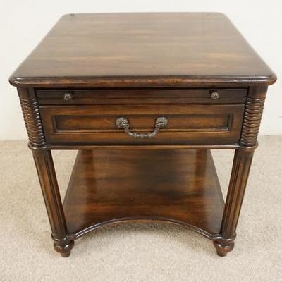 1034	ONE DRAWER LAMP TABLE WITH PULL OUT SURFACE. FLUTED AND TURNED LEGS. 24 IN SQUARE, 26 1/2 IN HIGH
